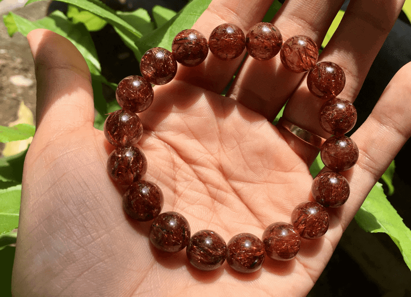 Thach Anh toc nau la da phong thuy vo cung dac biet, loai nay thuong dung de che tac vong tay