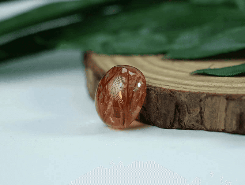 Trong phong thuy, da Thach Anh toc nau co cong dung chuyen hoa nang luong khong tot giup tam tri on dinh